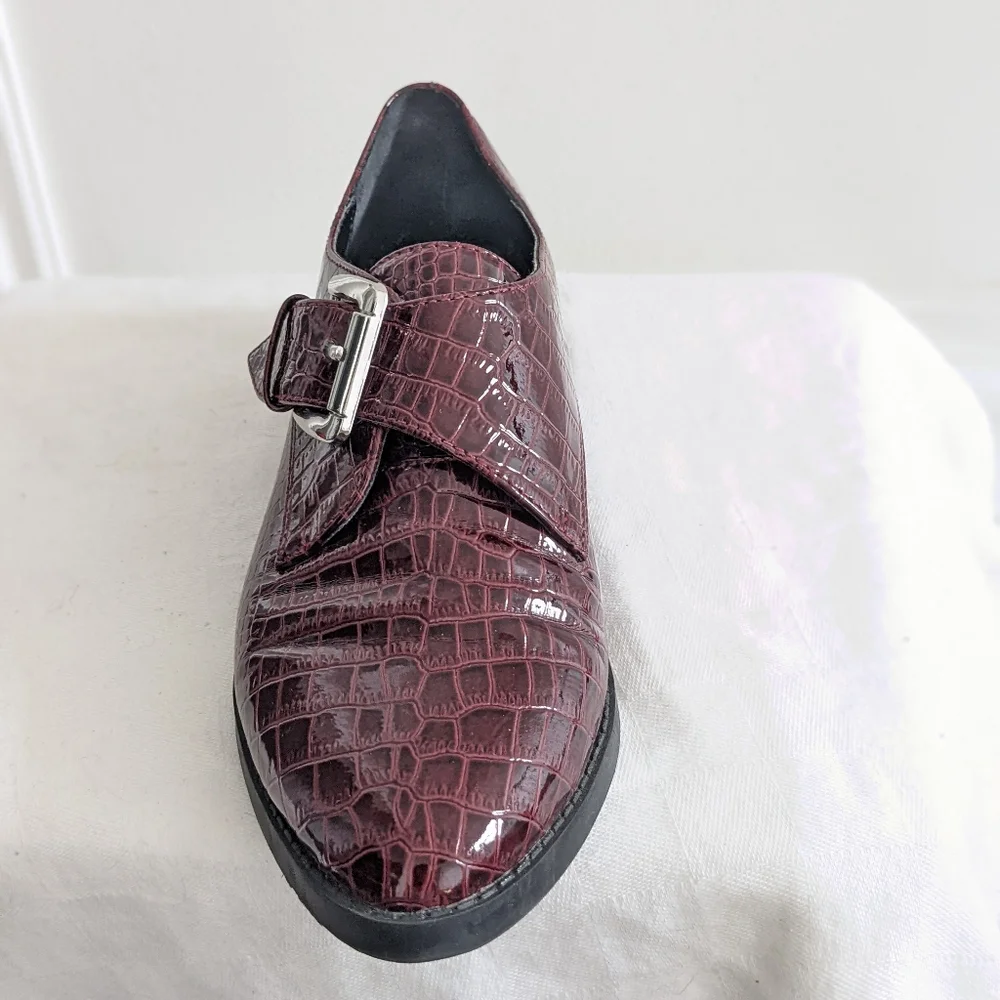 Patent leather loafers by Aldo